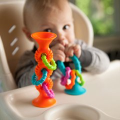 Брязкальце-прорізувач на присосках "PipSquigz Loops", помаранчевий - Fat Brain Toys